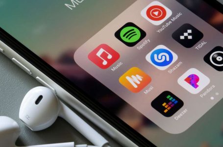 2F39289 Assorted music apps are seen on an iPhone - Apple Music, Spotify, YouTube Music, Musi, Shazam, TIDAL, Deezer, Pandora, and Qobuz.